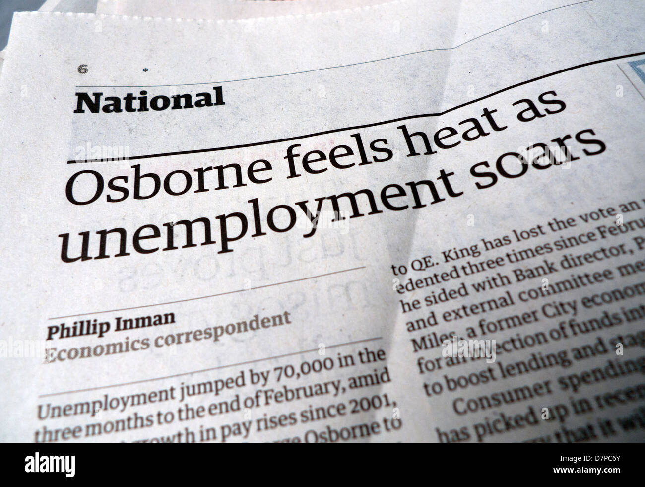 Guardian newspaper headline 'Osborne feels heat as unemployment soars' April 2013 Stock Photo