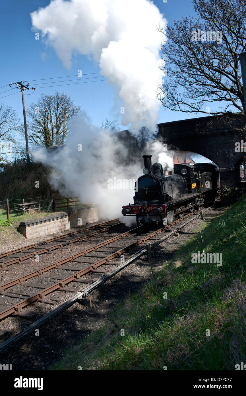 Steam locamotive leaving Sherringham station in North Norfolk. Stock Photo