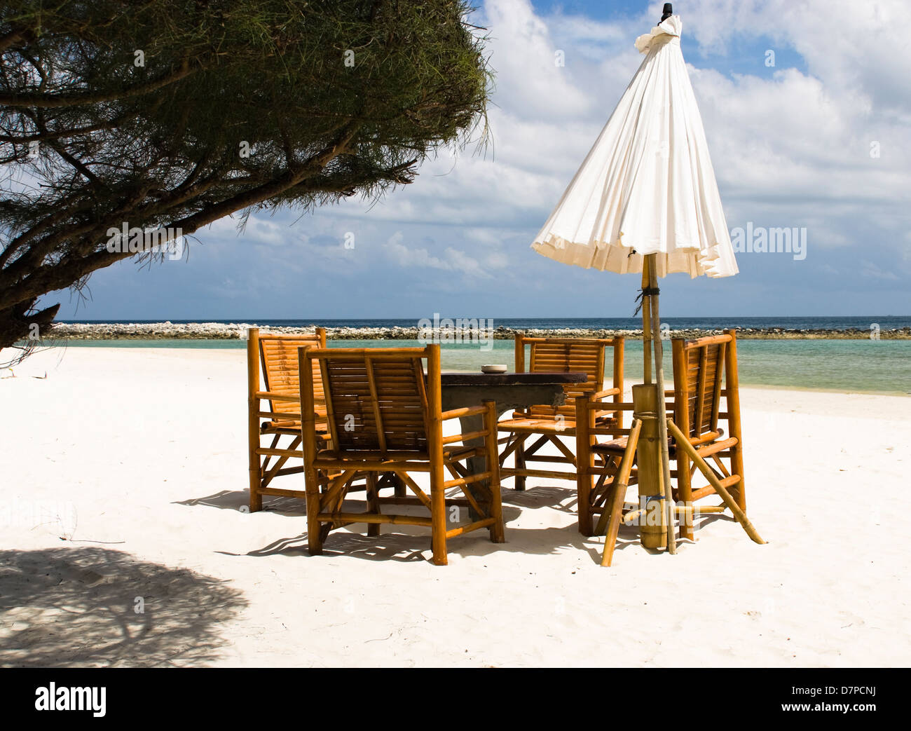 Beach in the bay Chaloklum, Thai island of Koh Phangan, Gulf of Thailand, wicker chairs, umbrella, sea view, Strandbar in der Stock Photo