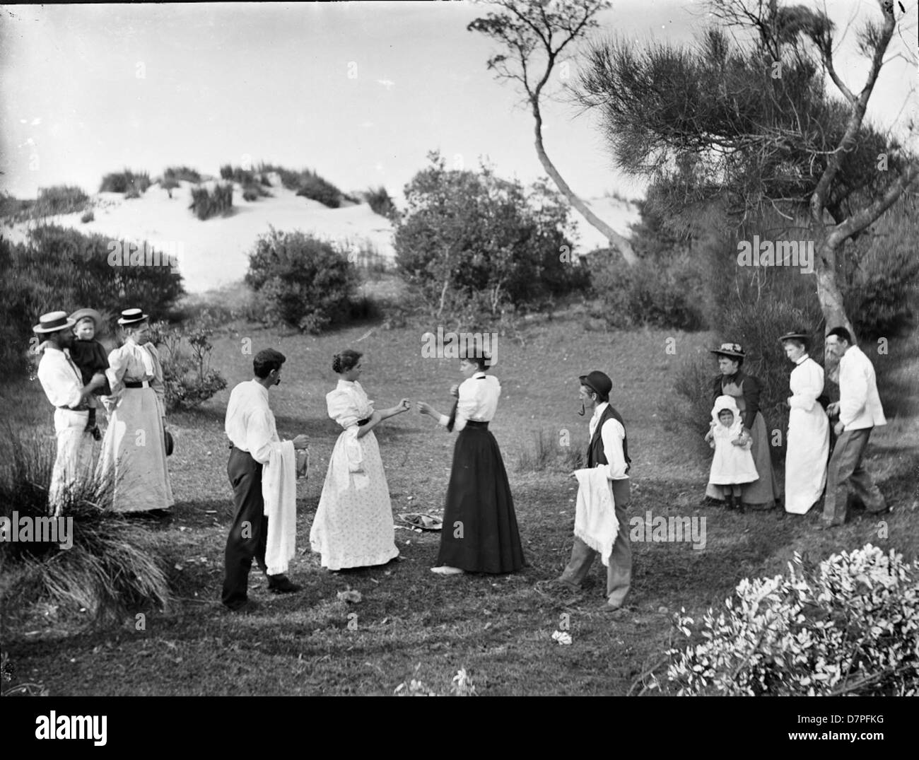 This image by Arthur Phillips captures two women boxing at Casuarina Clearing, dressed in boater hats. The photograph features an unusual and historical portrayal of women engaging in boxing, an activity not commonly depicted in early 20th-century images. Stock Photo