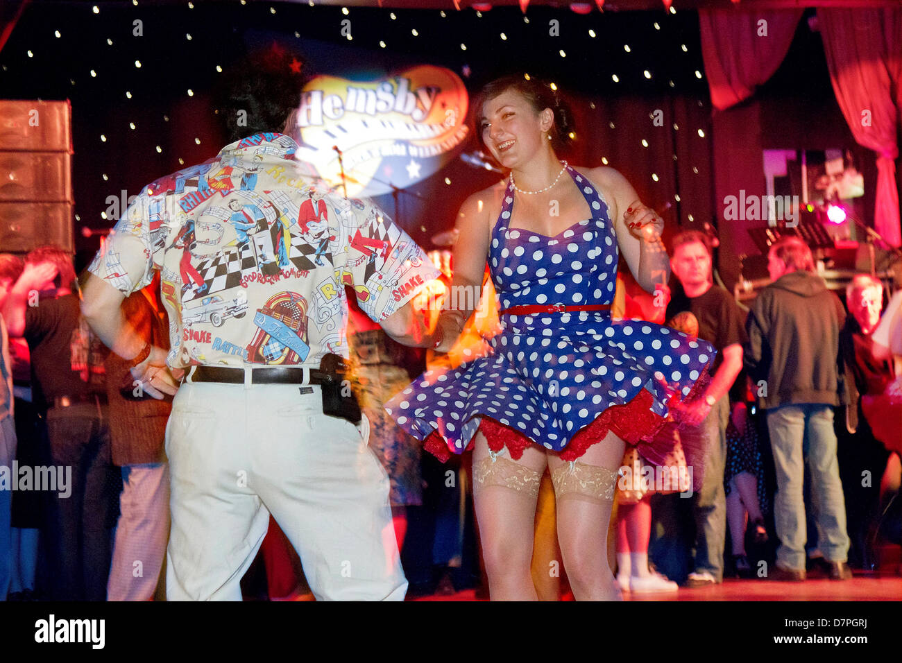 Norfolk, UK. 11th May 2013. Dancing the night away at the Hemsby Rock 'n' Roll Weekender.  Celebrating it's 25th Anniversary, the bi-annual Hemsby event is the longest running rock 'n' roll weekender of its kind and the most popular in the UK. Adrian Buck/Alamy Live News Stock Photo