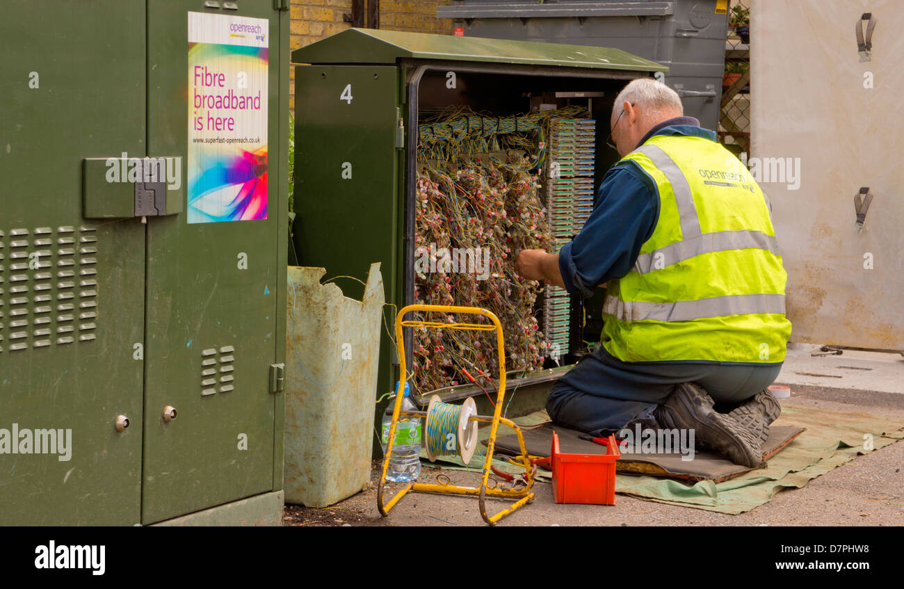 BT Worker Wires and working man Stock Photo