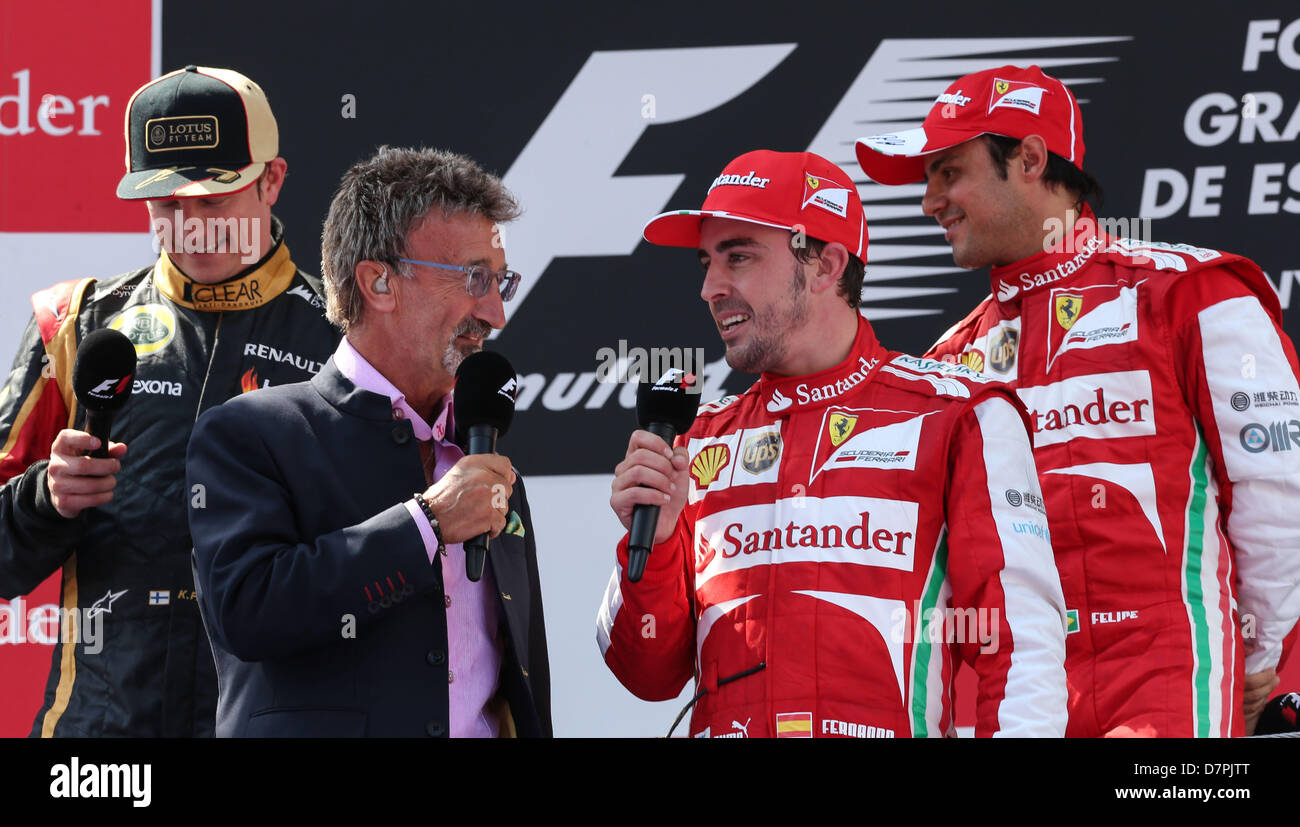 Ferrari's Kimi Raikkonen with the winners trophy on the podium after  winning the British Grand Prix at Silverstone, Northamptonshire Stock Photo  - Alamy