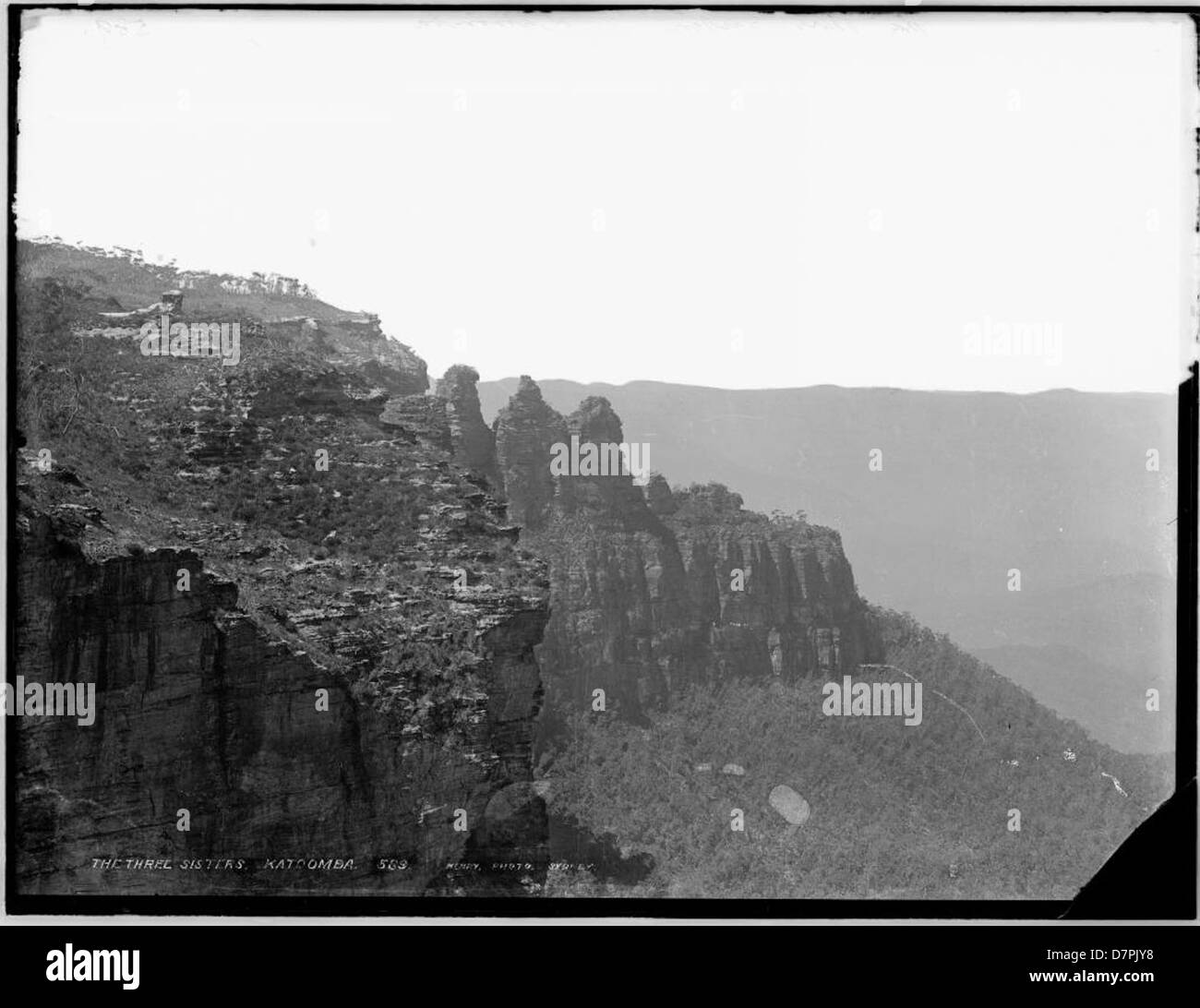 A historical photograph of the Three Sisters rock formation in Katoomba, New South Wales, highlighting this iconic natural landmark. Stock Photo