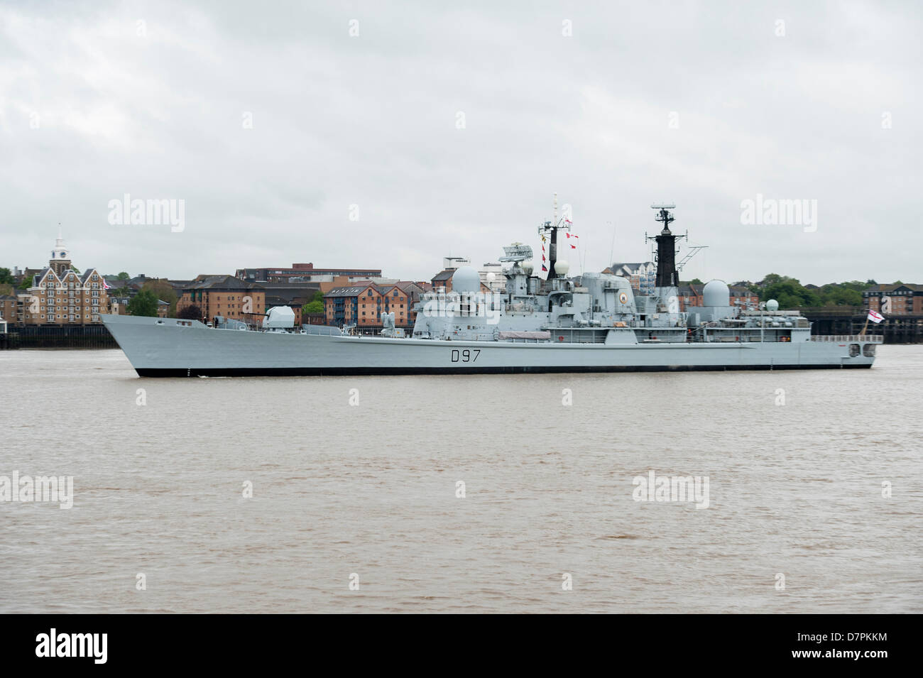 The British Naval ship HMS Edinburgh a type 42 destroyer in the River Thames, en-route to Leth, Scotland to be decommissioned. Stock Photo