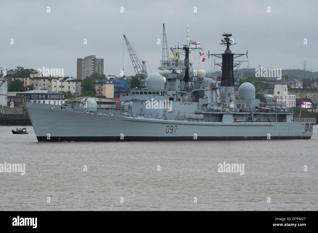 The British Naval ship HMS Edinburgh a type 42 destroyer in the River Thames, en-route to Leth, Scotland to be decommissioned. Stock Photo