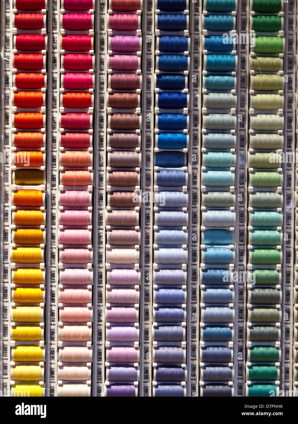 Reels of cotton displayed for sale Stock Photo