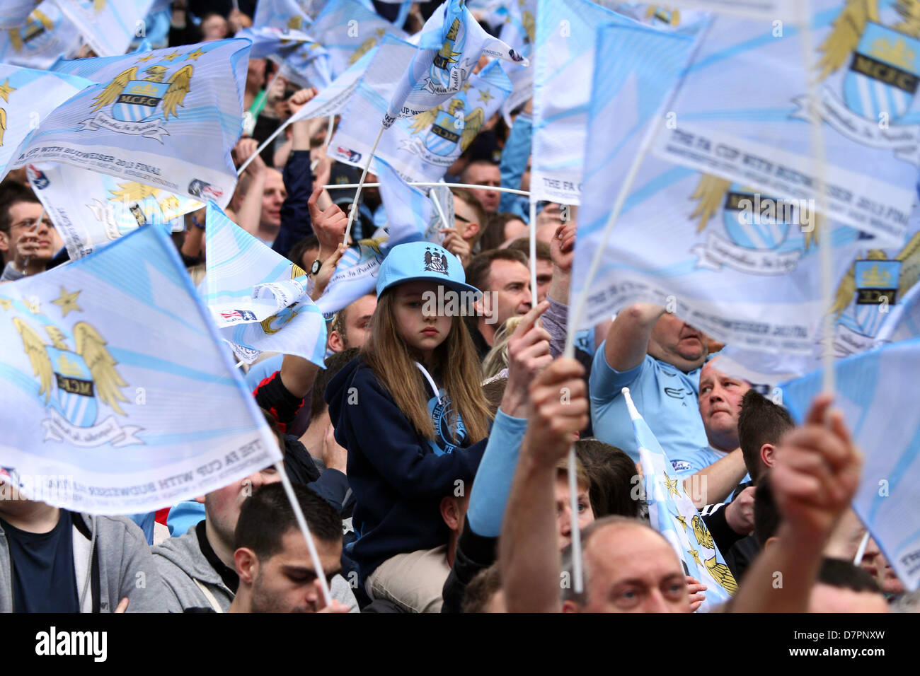 FA Cup Final - Manchester City v Wigan Athletic         Wembley Stadium, London, UK       May 11, 2013            A young Man City fan surrounded by fans being waved. *This image is for editorial use only* Pic: Paul Marriott Photography Stock Photo