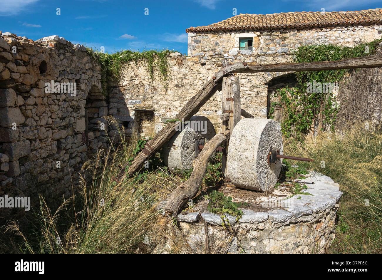 An old and ruined olive press at Trachila in the outer Mani Messinia Southern Peloponnese Greece Stock Photo