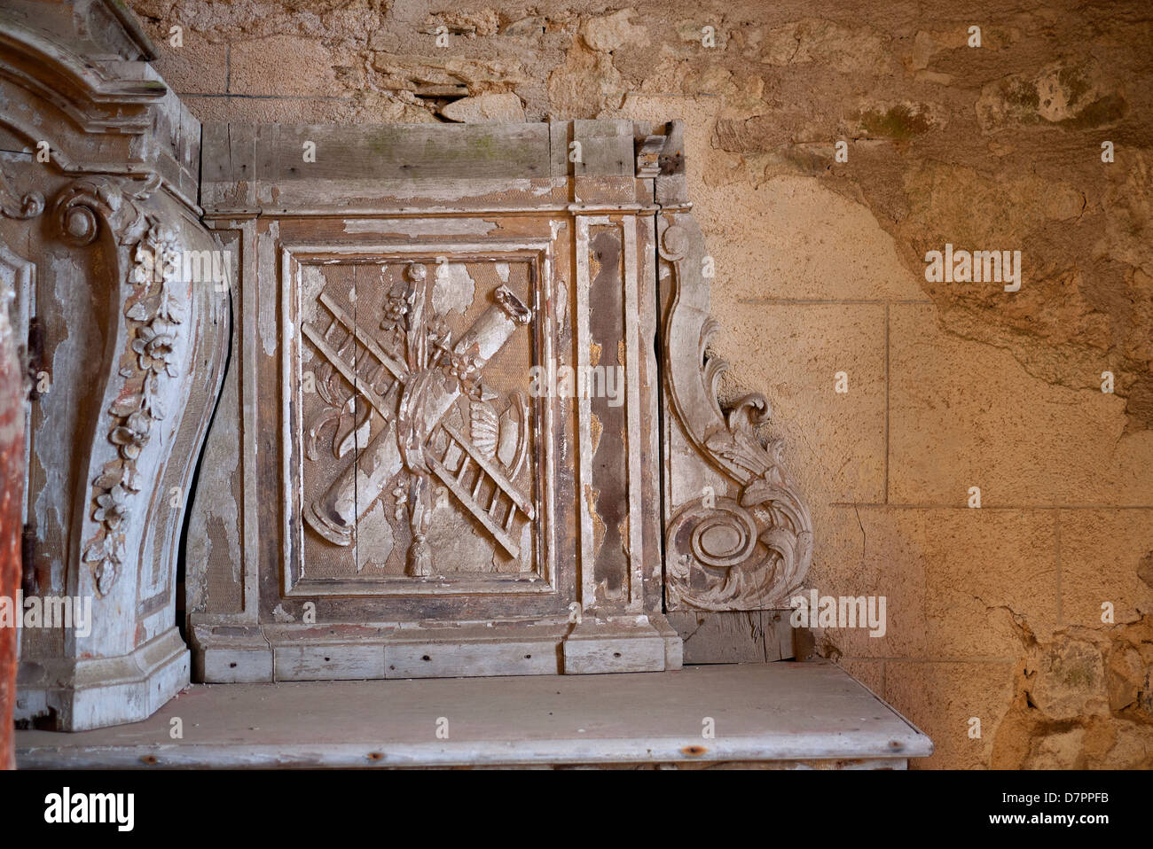 Oradour-sur-Glane near Limoges in France. Remains of wood carvings in the church. Stock Photo