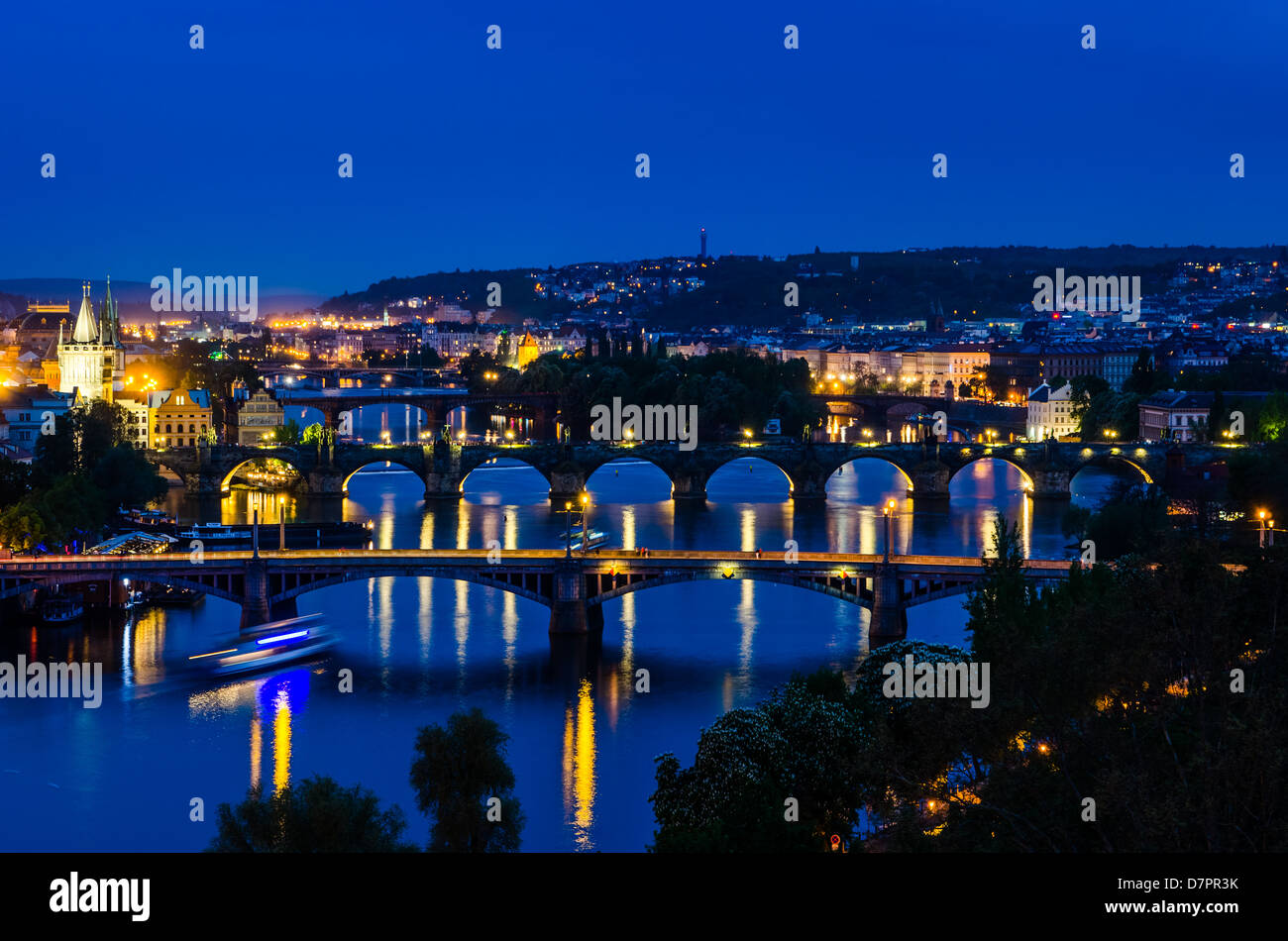 Skyline view over the Vltava river and bridges in Prague at sunset, Czech Republic Stock Photo