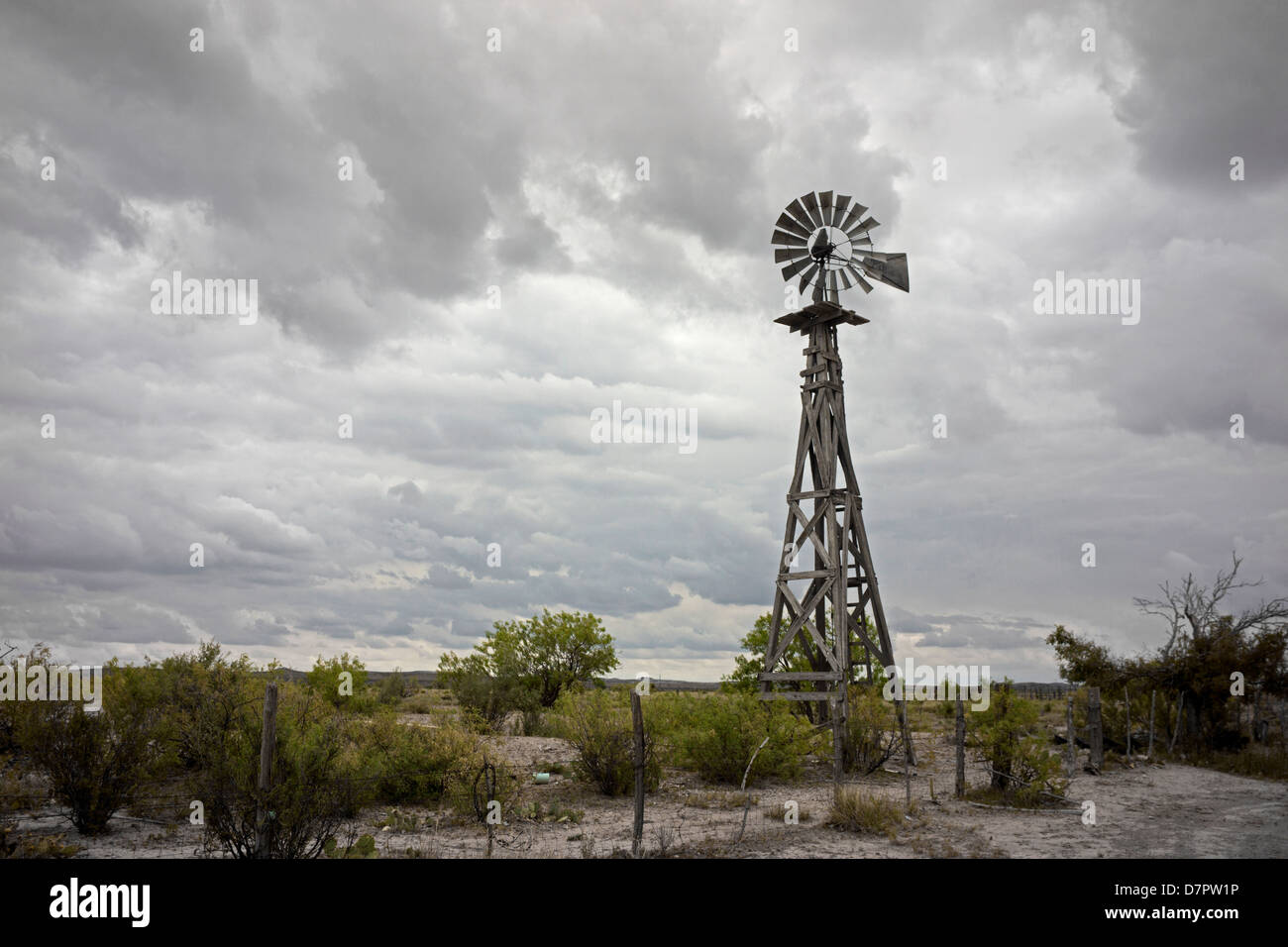 Old windmill us to pump water in the Big Bend region of West Texas. Stock Photo