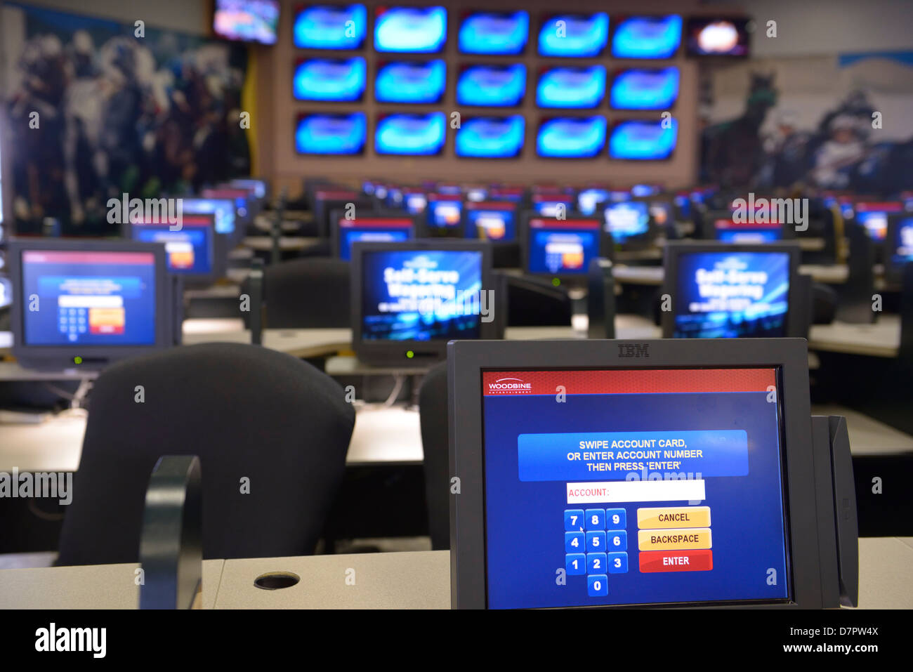 Bookmakers Computer Screen Empty room of computer screens for self-serve wager betting on horse ...