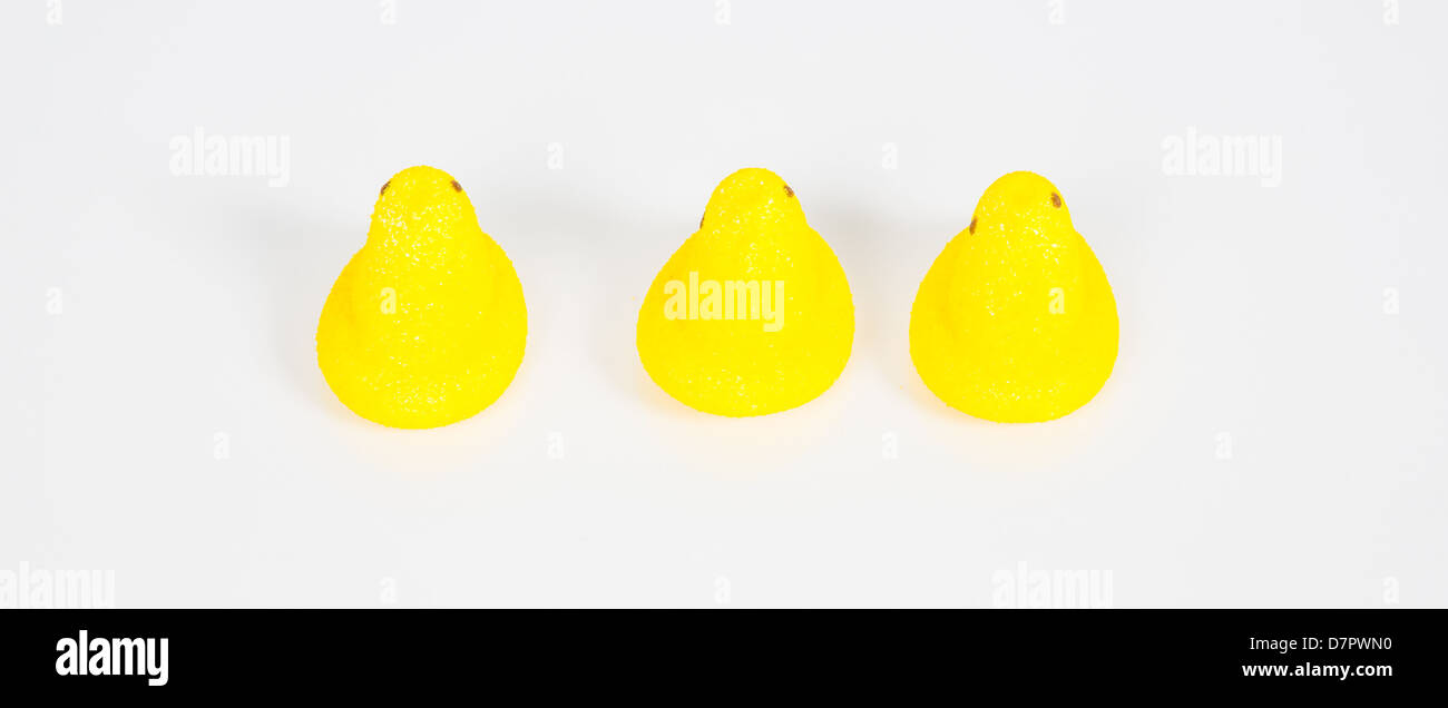 Yellow Easter candy on a white Background. Stock Photo