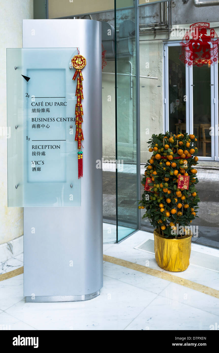 dh Metropark Hotel CAUSEWAY BAY HONG KONG Chinese New Year minature decorations small Orange tree in pot displayed at hotel entrance Stock Photo