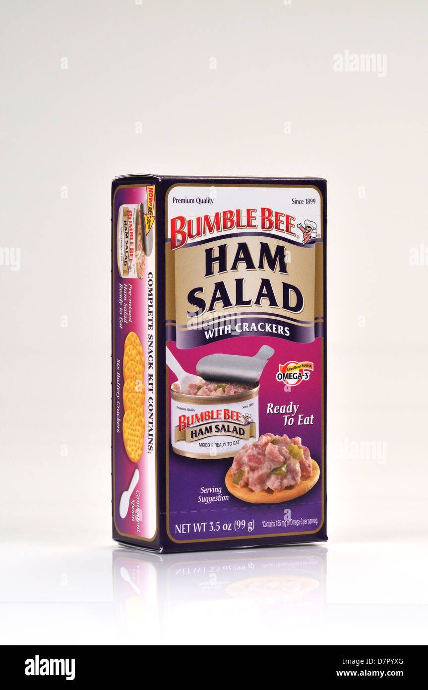 Packet of Bumble Bee Ham salad with crackers ready to eat on white background cutout. Stock Photo
