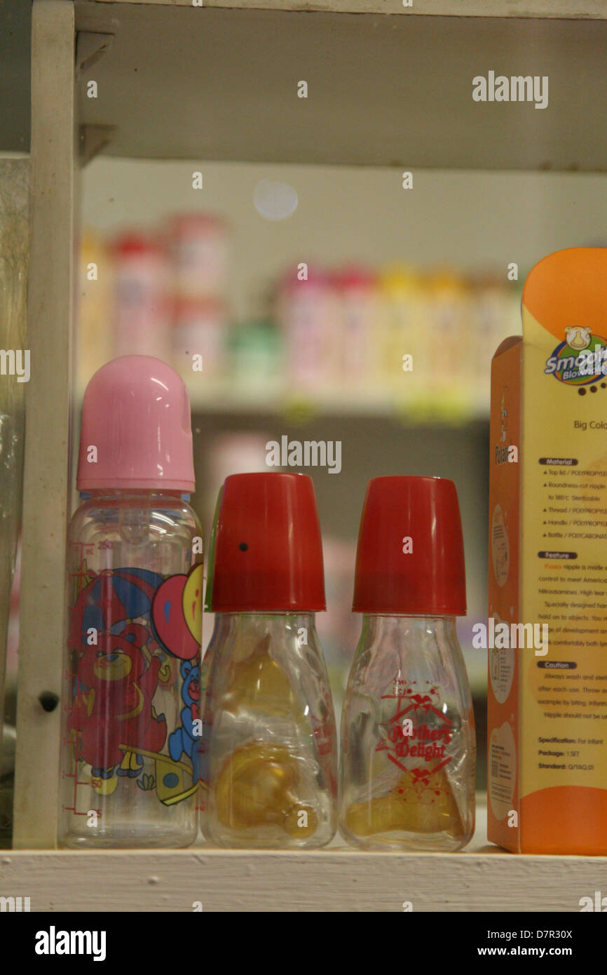 Plastic milk bottles for infants Stock Photo Alamy