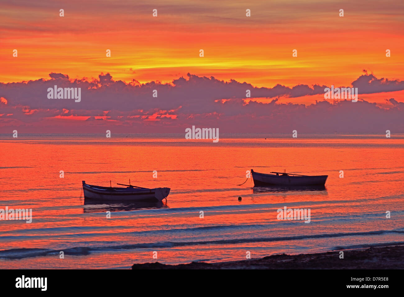 Boats at sunrise, Mediterranean, Zarzis, Tunisia. Stock Photo