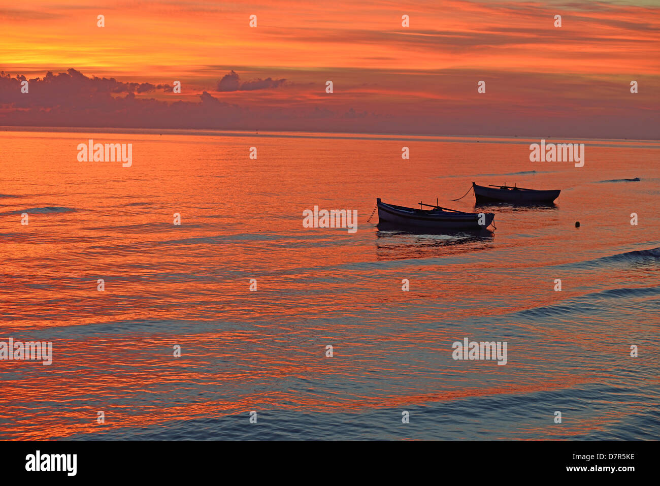 Boats at sunrise, Mediterranean, Zarzis, Tunisia. Stock Photo