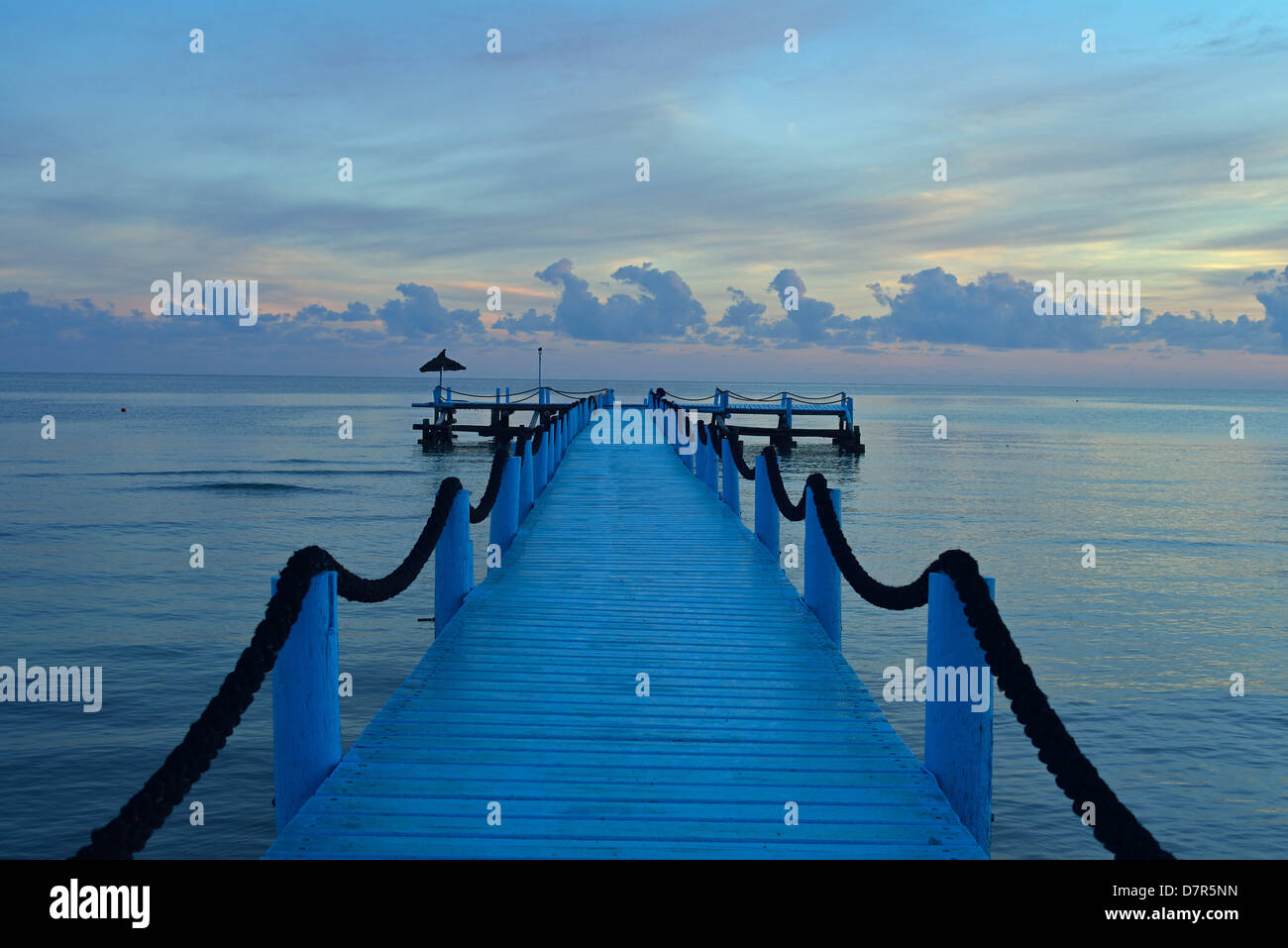 Pier at sunrise of Odyssee Resort and Spa at Zarzis, Tunisia Stock Photo