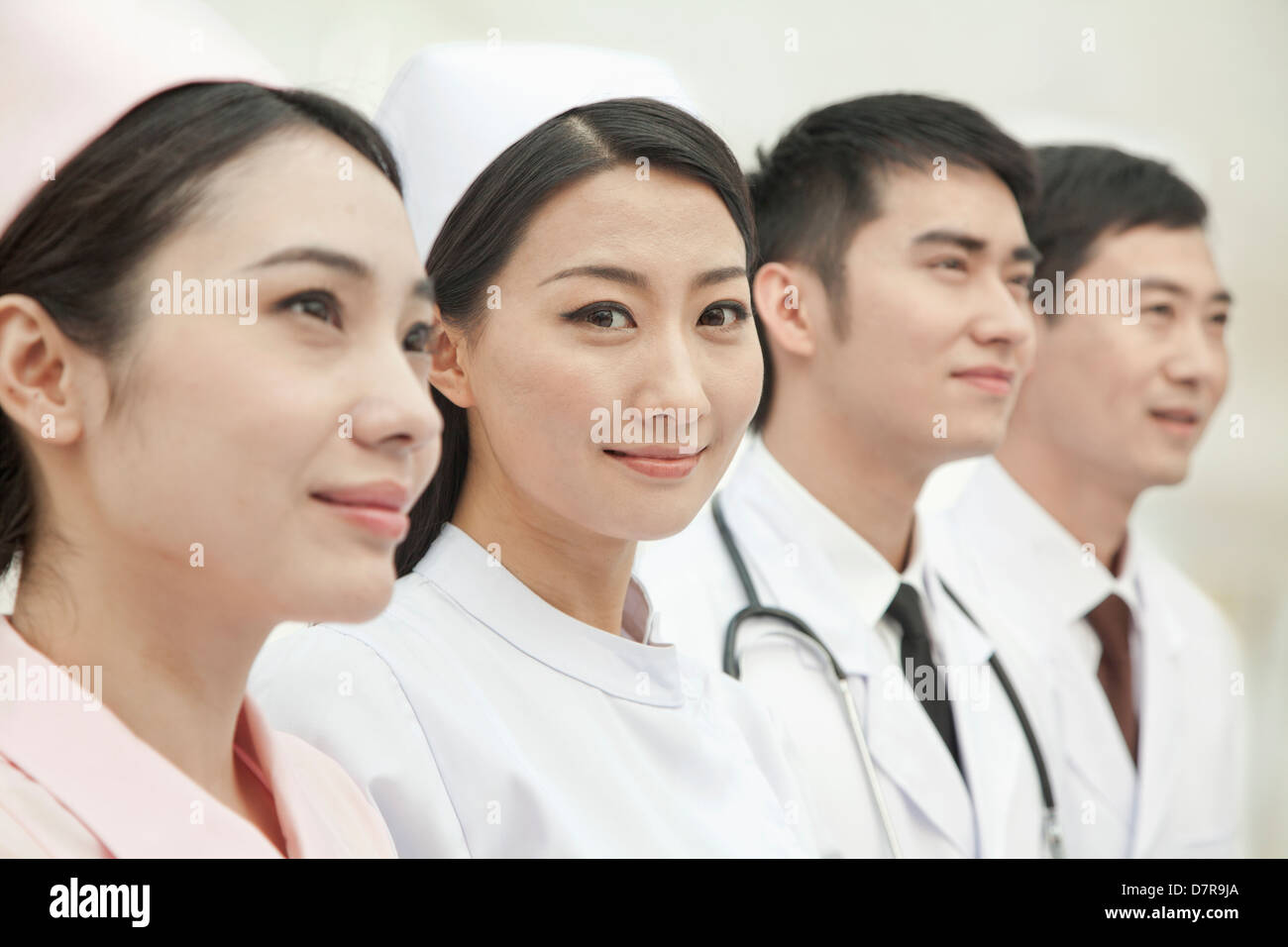 Healthcare workers standing in a row, China Stock Photo