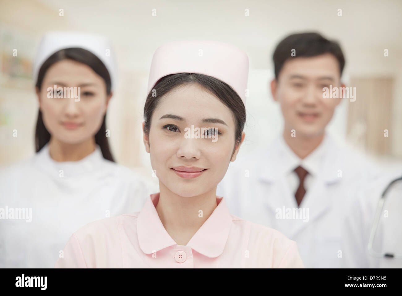 Three Healthcare workers, portrait Stock Photo Alamy