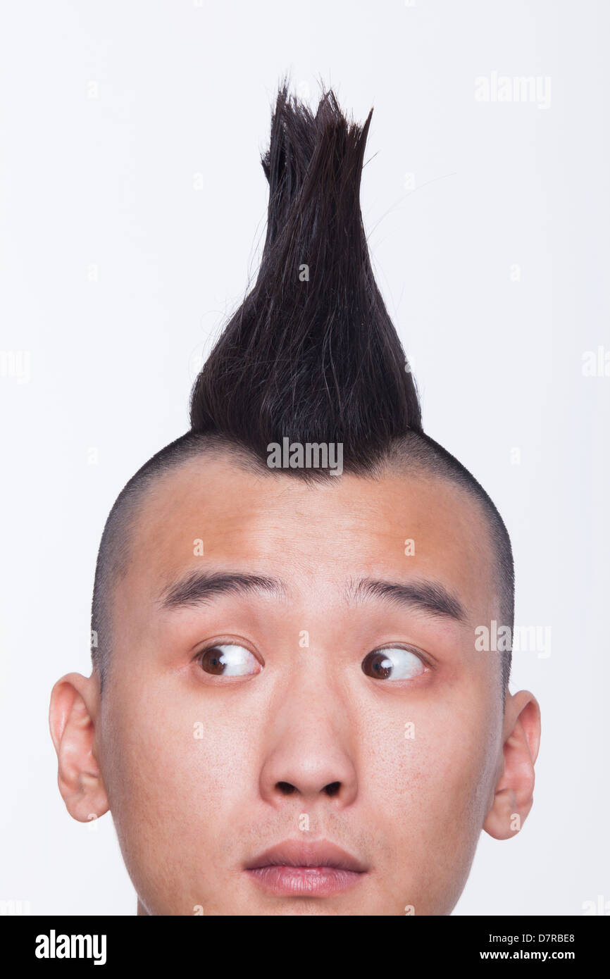 Young man with Mohawk close-up Stock Photo