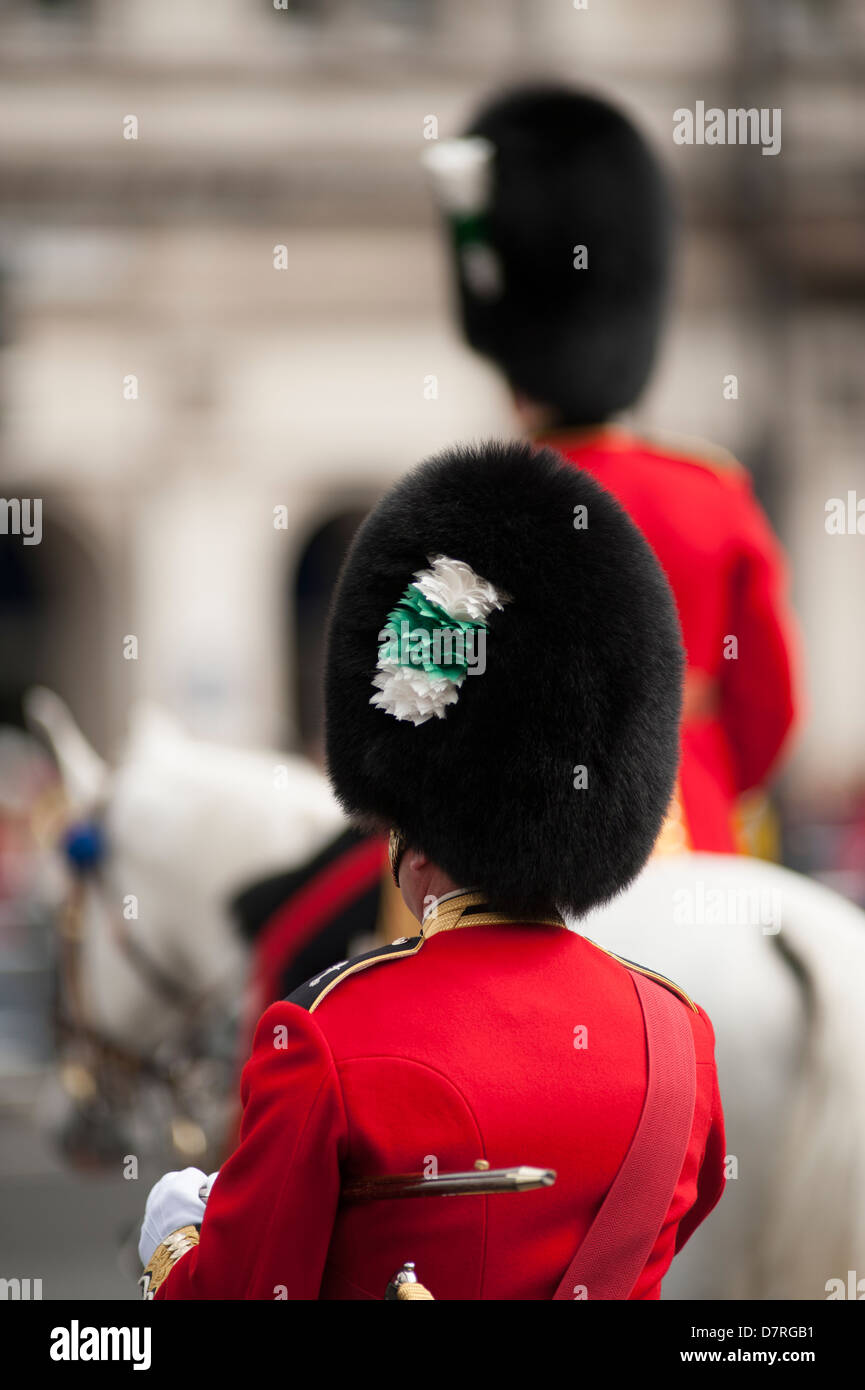 Welsh Guards wearing Bearskins with distinctive white and green plume during the annual State Opening of Parliament. Stock Photo