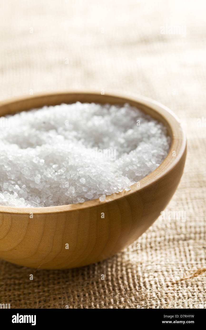 the white salt in wooden bowl Stock Photo