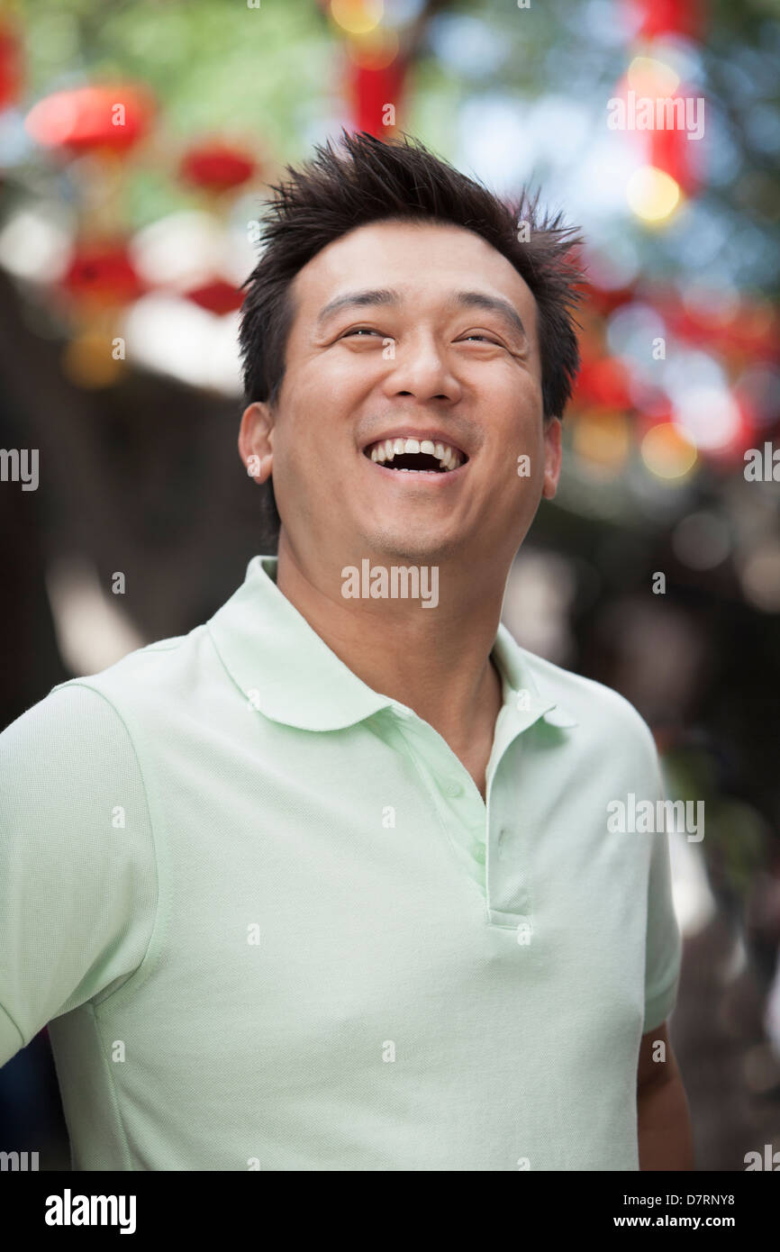 Laughing mid adult man in nanluoguxiang hi-res stock photography and ...