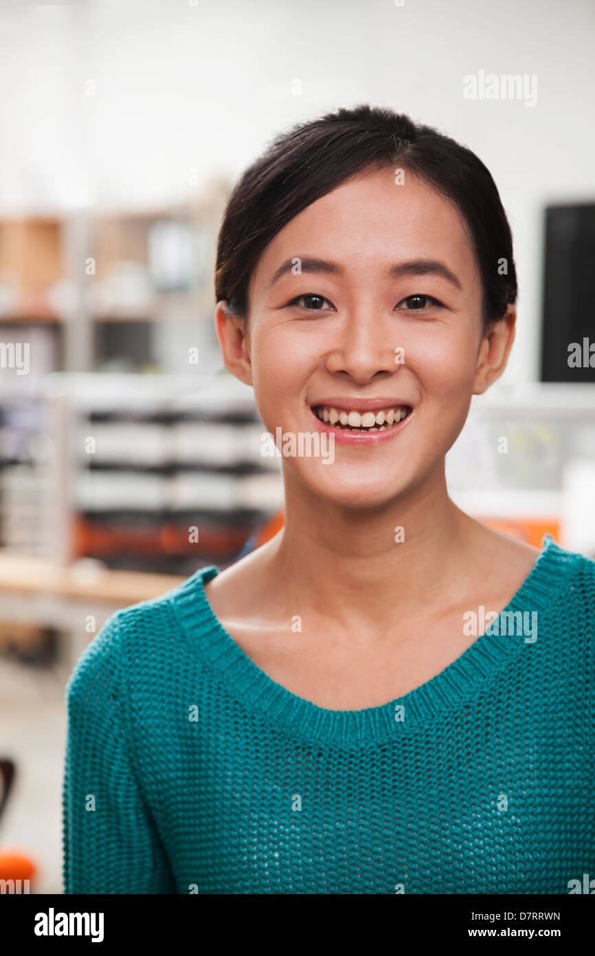 Portrait of young businesswoman in the office Stock Photo - Alamy