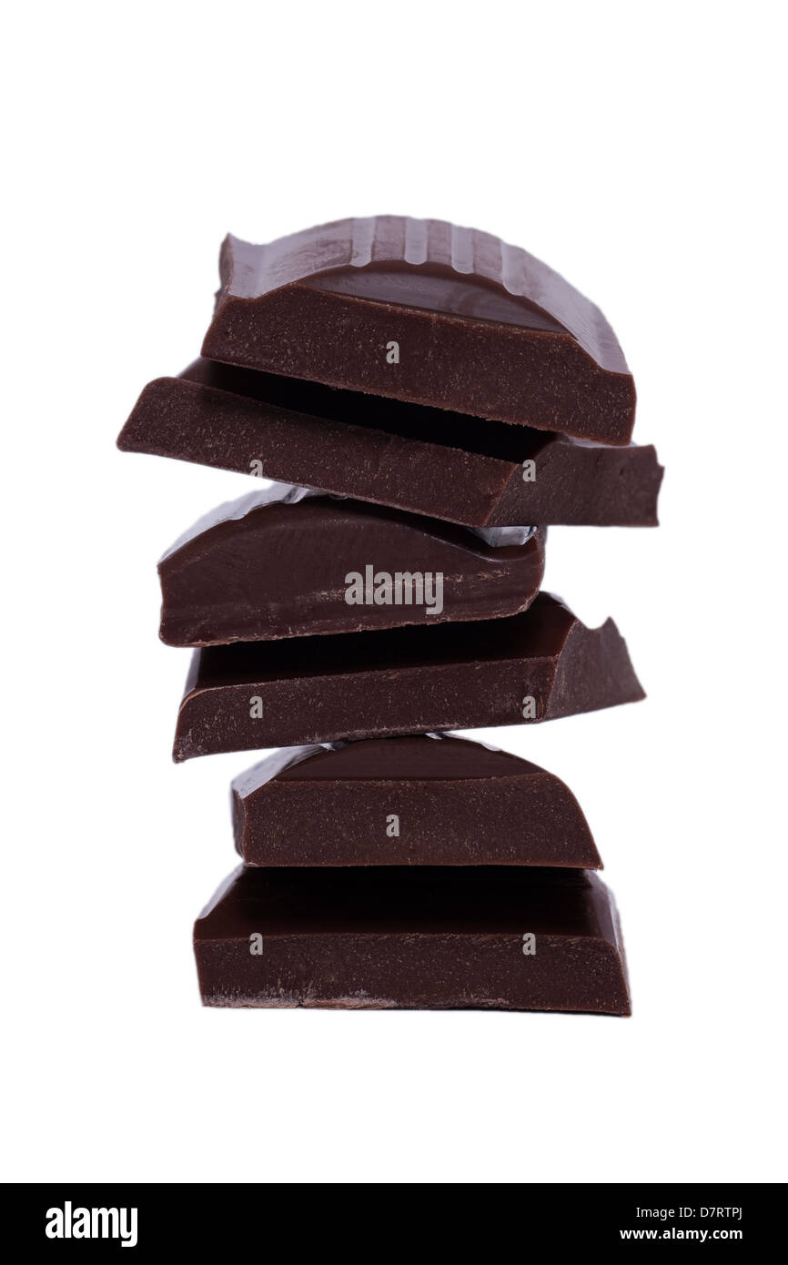 A stack of milk chocolate on a white background Stock Photo - Alamy