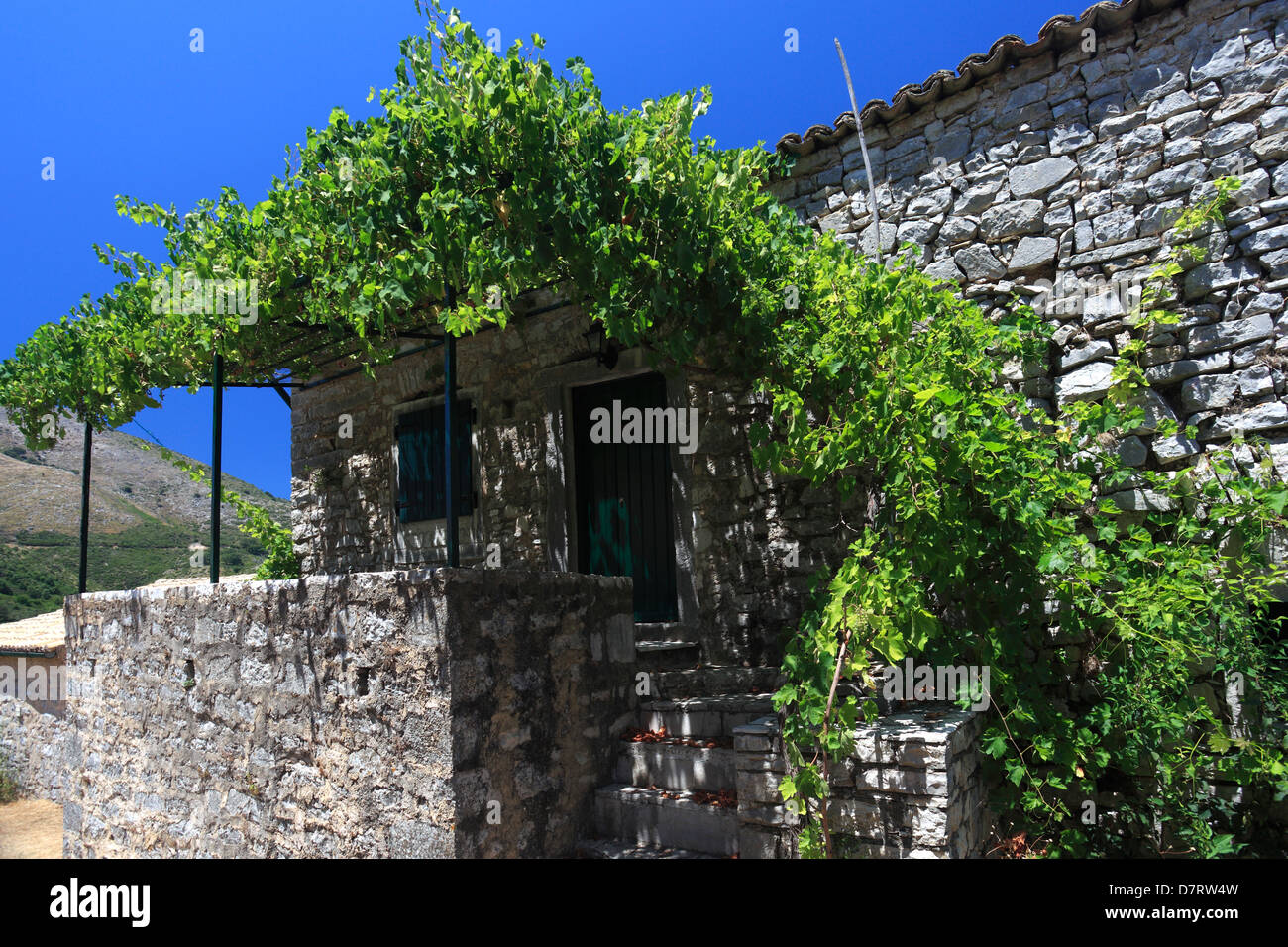 the ruined deserted village of Paleo Perithia, north east Corfu Island, Greece. Stock Photo