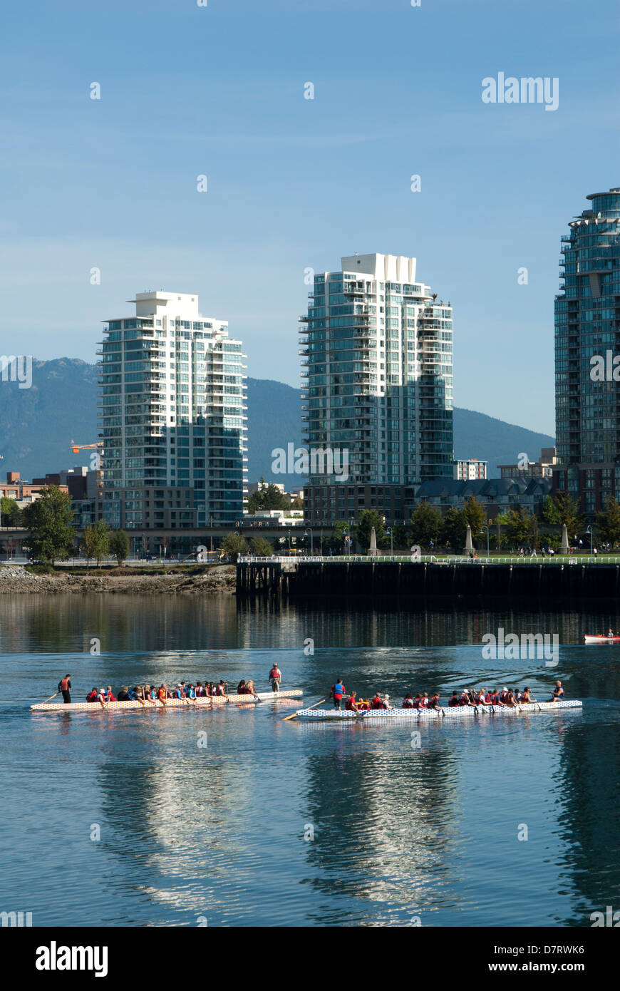 Dragon boat racers practicing in the waters of False Creek, Vancouver, British Columbia, Canada Stock Photo