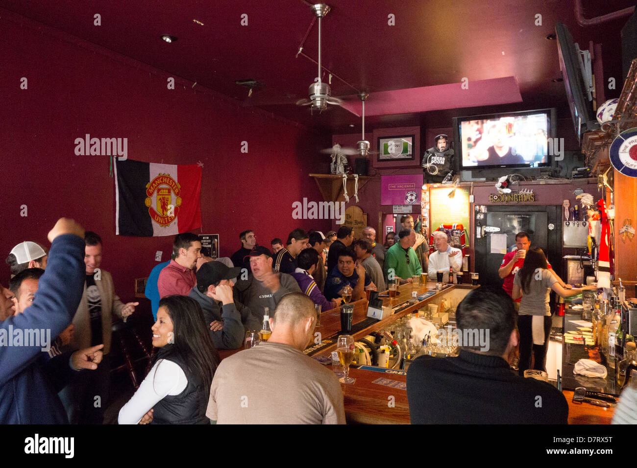 People Watch Epl Soccer On Tv At The Press Room Pub Santa