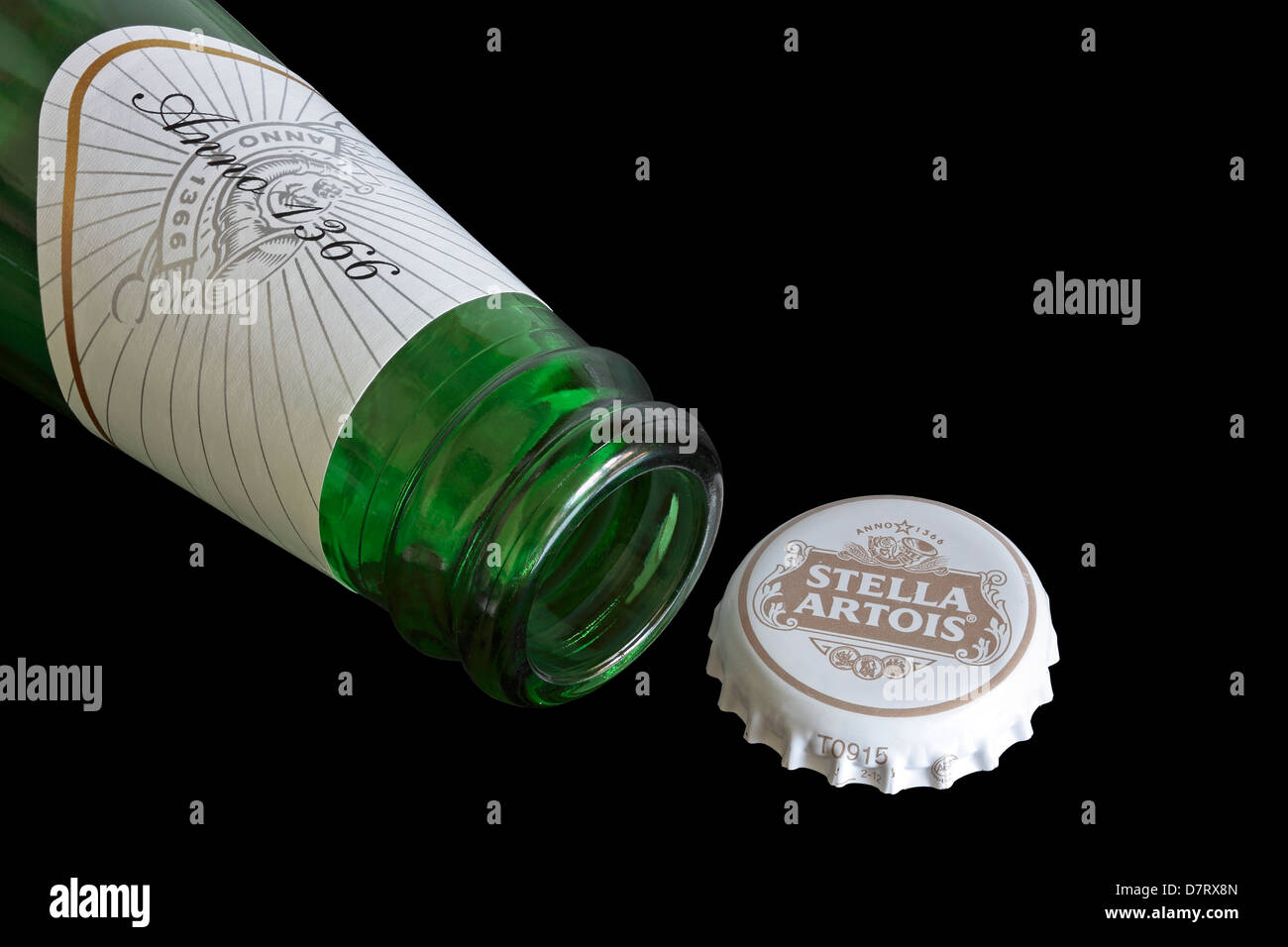 Open Bottle of Stella Artois with cap Stock Photo