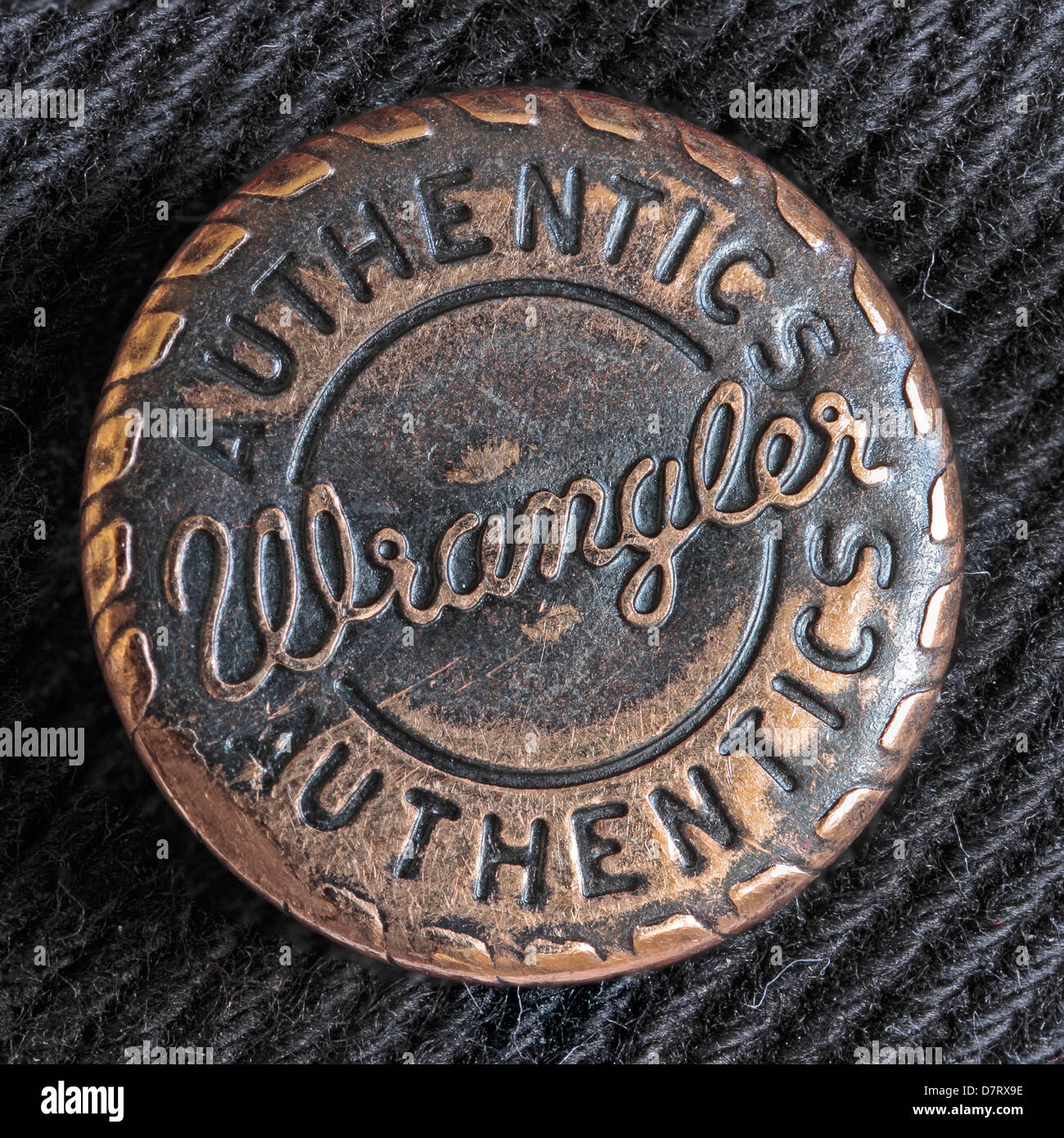 Wrangler Authentics Button on a black denim pair of jeans Stock Photo -  Alamy