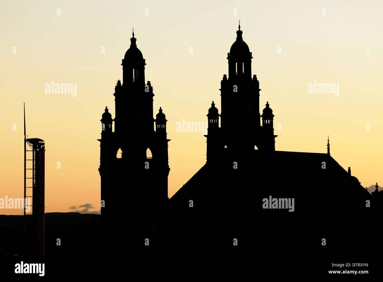 Silhouette of the Victorian Kelvingrove Art Gallery and Museum and contemporary Observation Tower at sunset, Glasgow, Scotland, UK Stock Photo