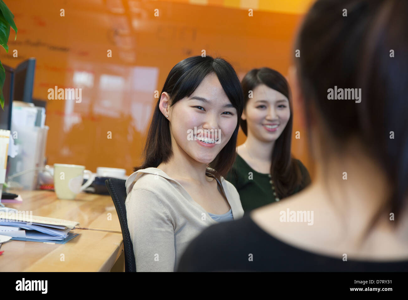 Businesswomen Having Meeting in the Office Stock Photo - Alamy