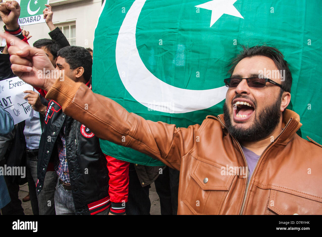 London, UK. 13th May, 2013. A Pakistani protester chants slogans against the alleged rigging of Pakistan's general election. Credit: Paul Davey/Alamy Live News Stock Photo