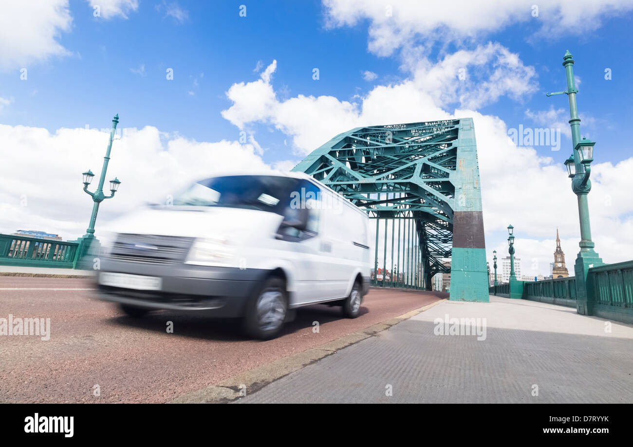 Busy traffic crossing the Tyne Bridge at Newcastle Upon Tyne. Stock Photo