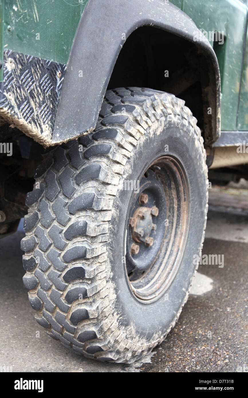 Dirty tire of a Sports Utility Vehicle Stock Photo
