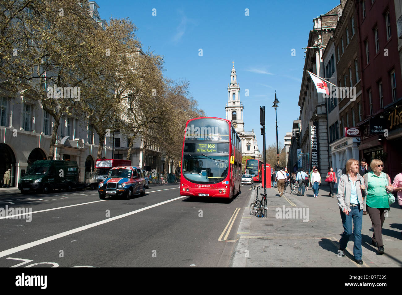 Bus and people on the Strand, London, UK Stock Photo