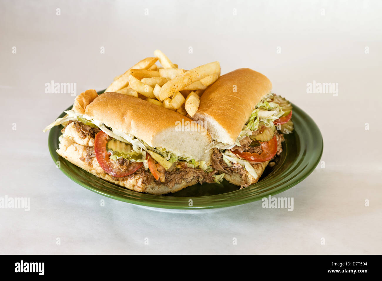 Roast beef po'boy with fries Stock Photo Alamy