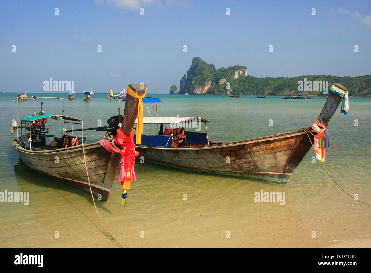Long-tail boats at Ao Loh Dalum beach, Ko Phi Phi Don, Thailand Stock Photo