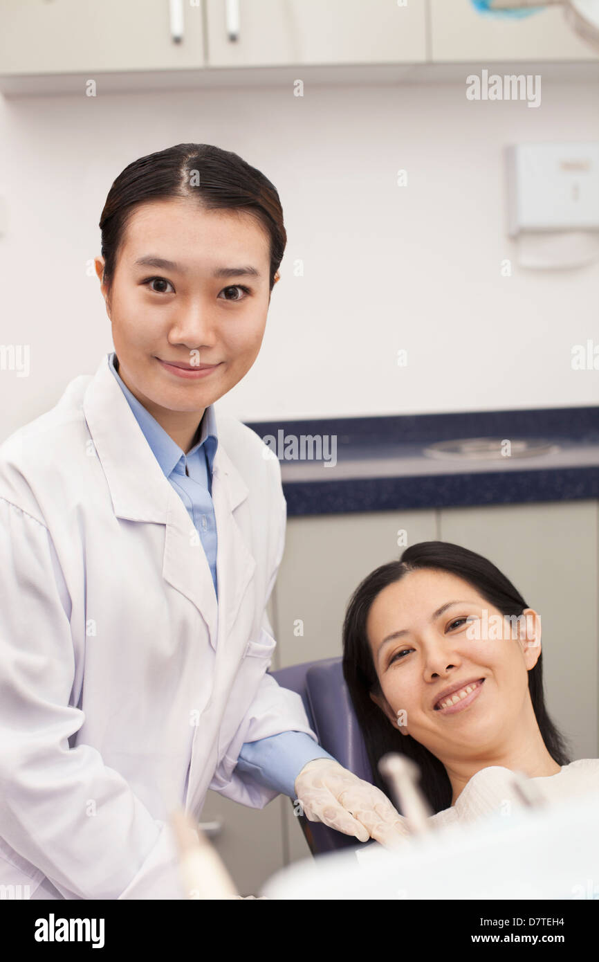 Portrait Of Dentist And Patient Stock Photo Alamy
