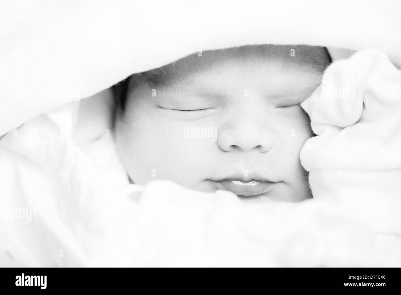 beautiful newborn baby sleeping, black and white image Stock Photo