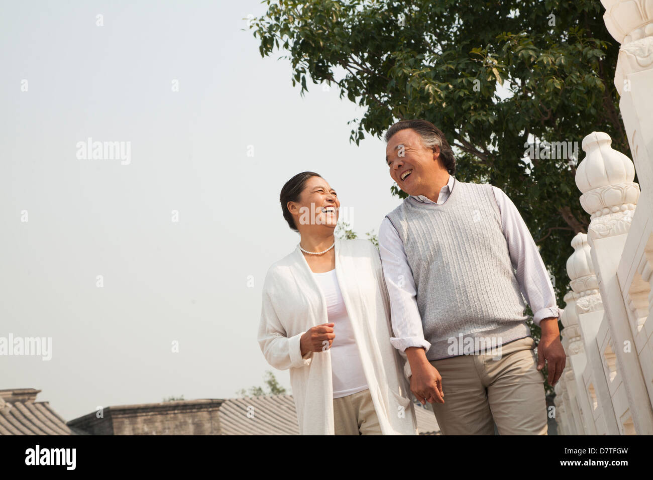 Senior chinese couple walking hi-res stock photography and images - Alamy