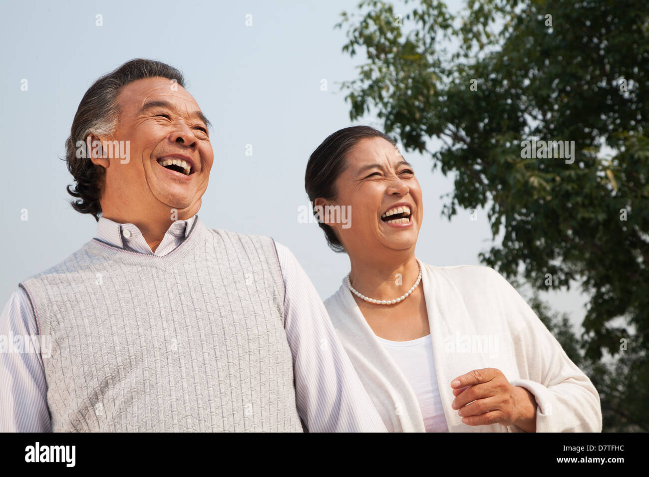 Happy senior chinese couple walking hi-res stock photography and images ...