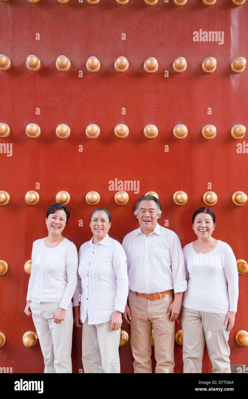 Group of mature people standing next to traditional Chinese door, portrait  Stock Photo - Alamy